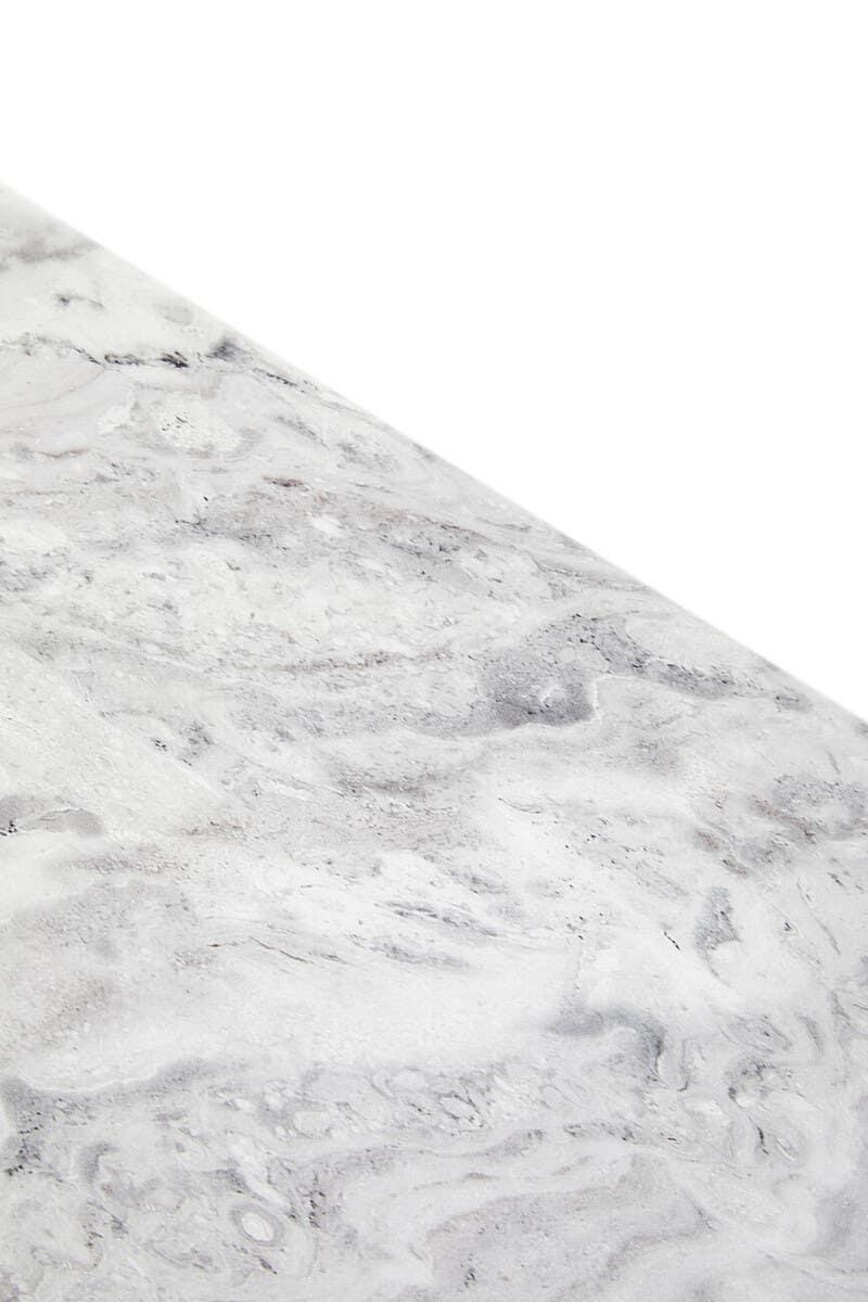 Light grey marble tabletop surface with natural veining detail, closeup angle