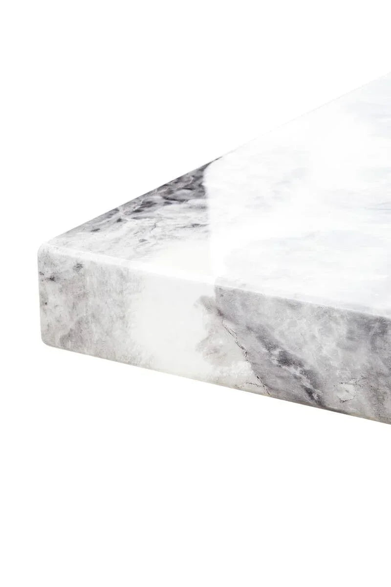 Close-up of marble table top with grey and white veining