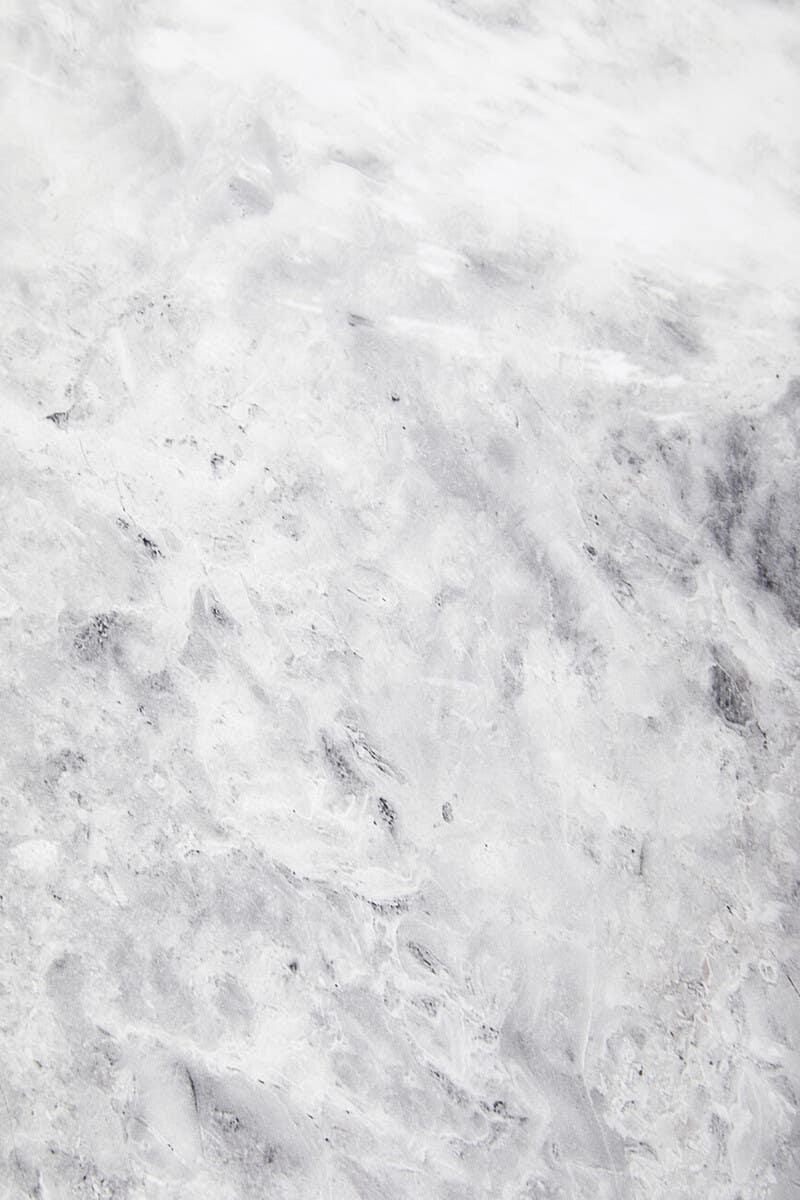 white marble table top with grey veining detail