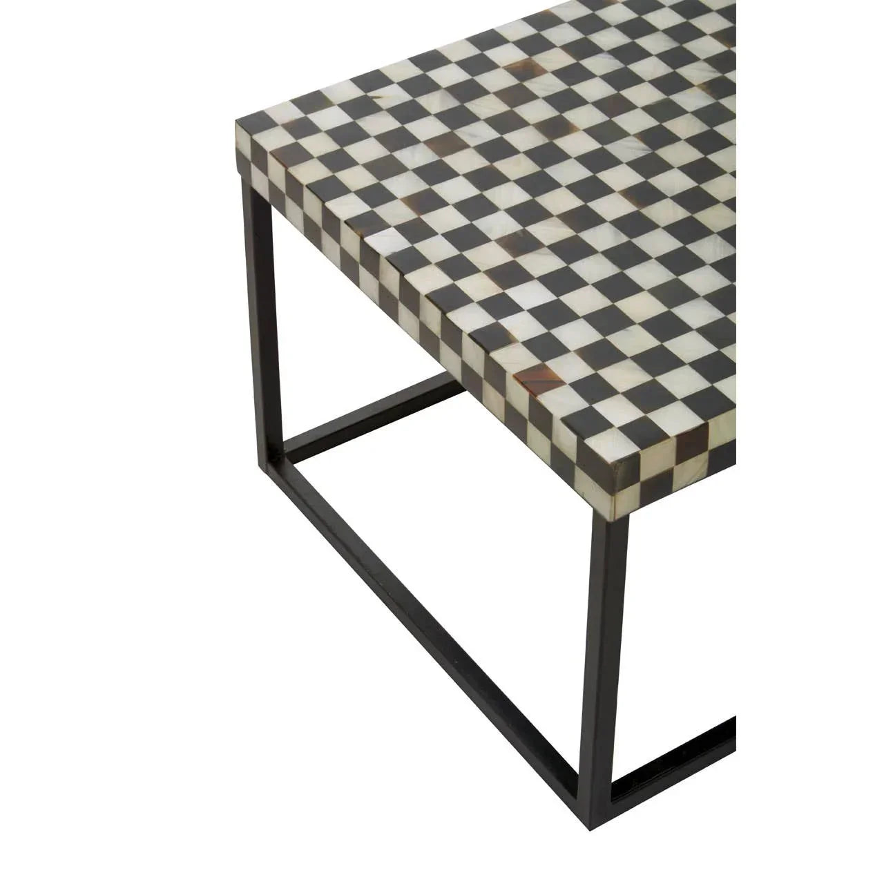 Checkered coffee table with black and white square pattern and metal frame, angled view