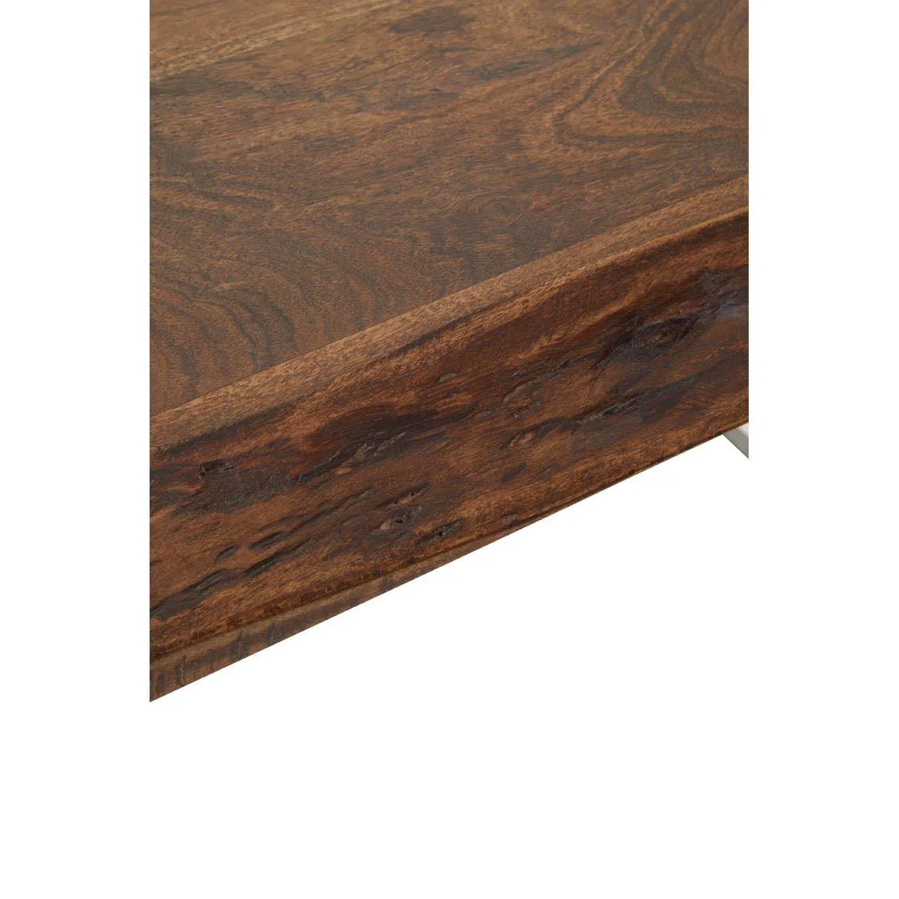 Closeup of solid wood coffee table corner with natural grain and live edge details