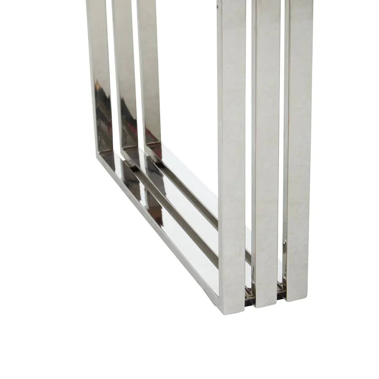Chrome metal table legs with a modern linear design, close-up view of frame base