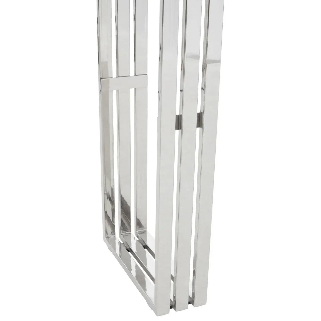 Closeup chrome table leg with modern rectangular metal frame design