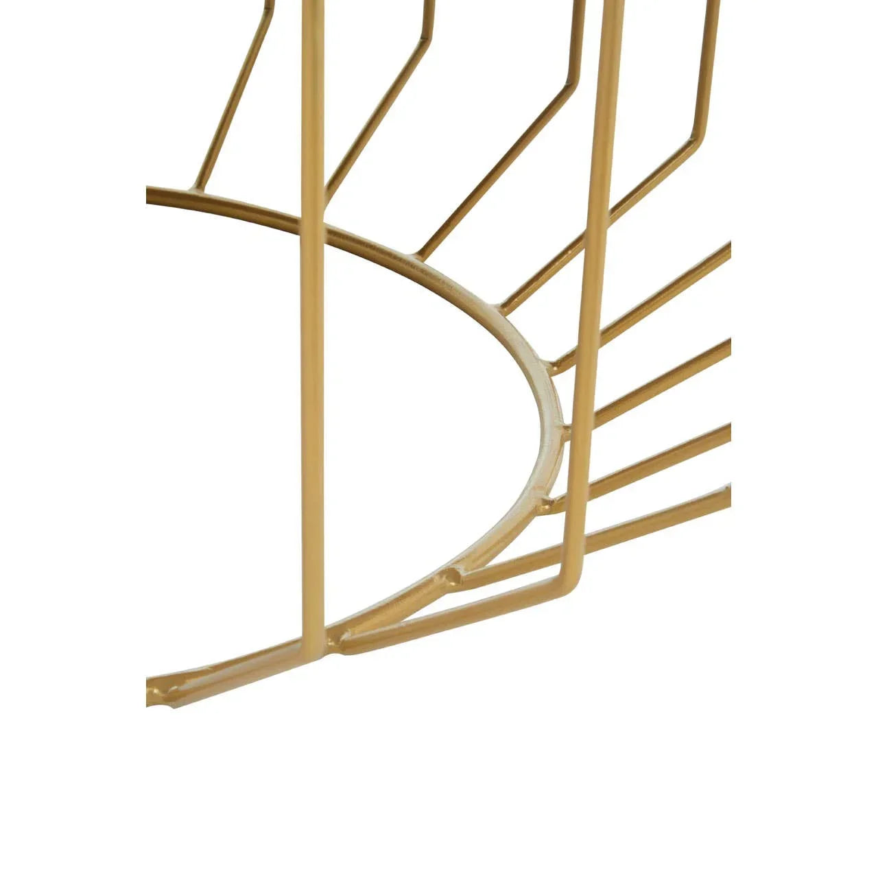 Gold metal table base with geometric open frame design, close-up view