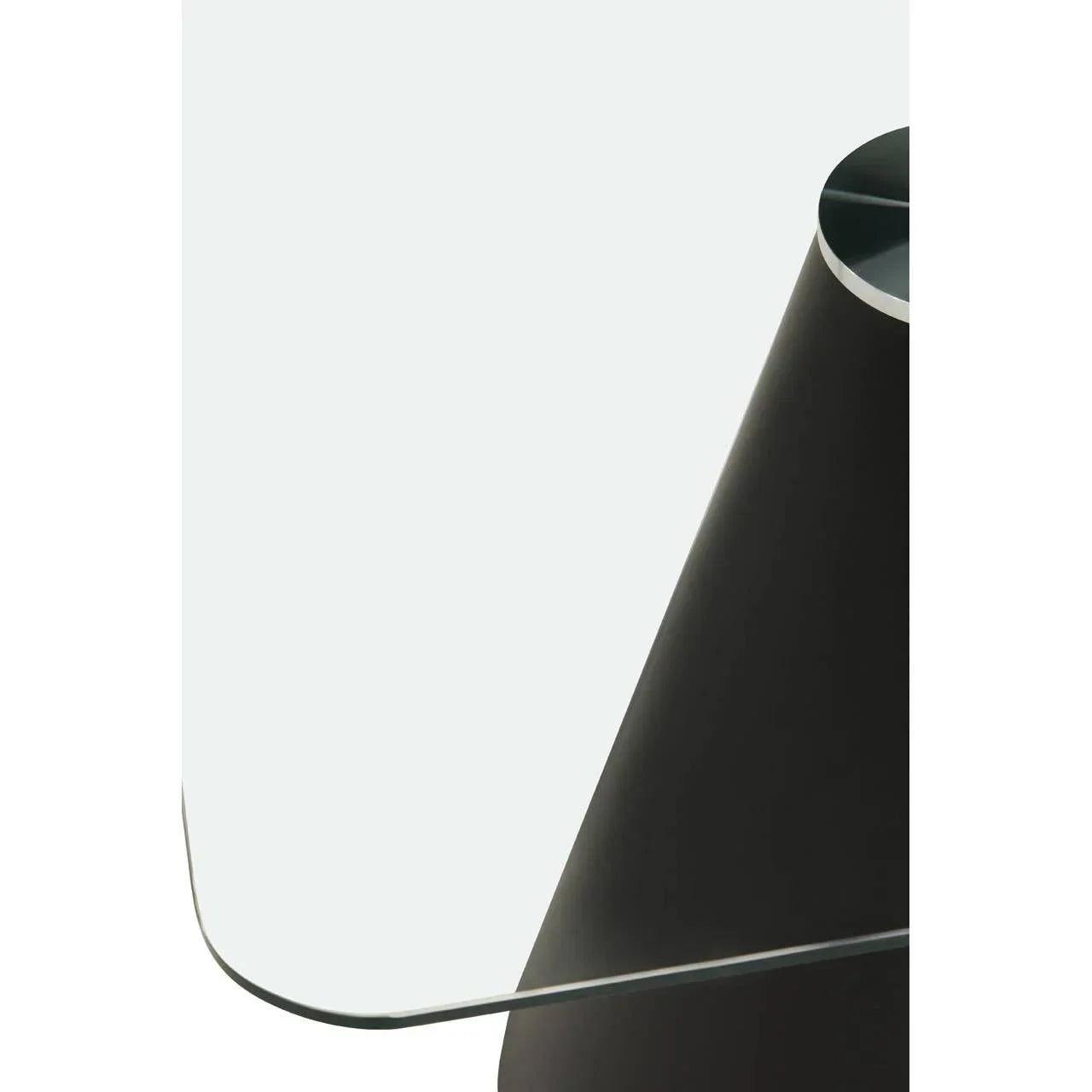 Glass top dining table corner with black conical base detail