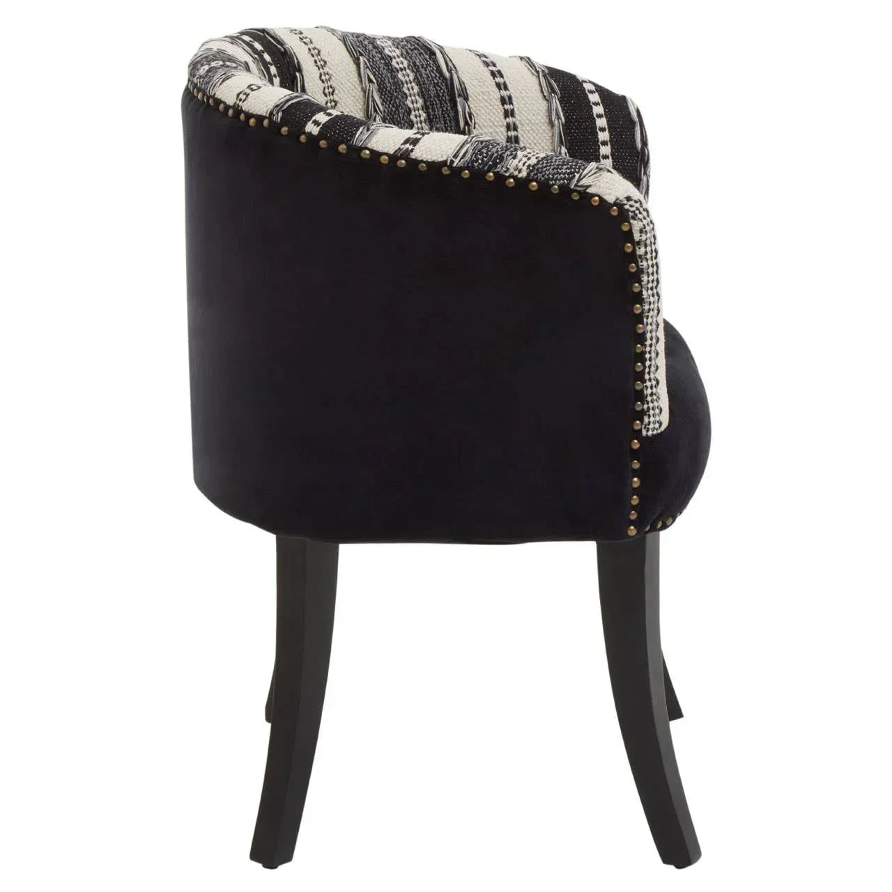 Black velvet accent chair with patterned fabric backrest and brass stud detailing
