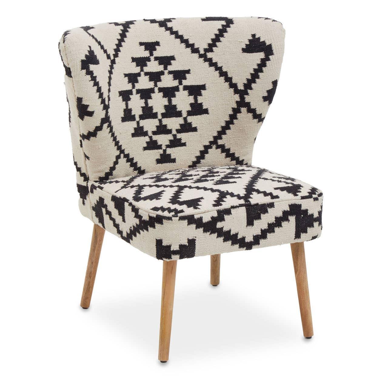Accent chair with black and cream geometric upholstery and wooden legs