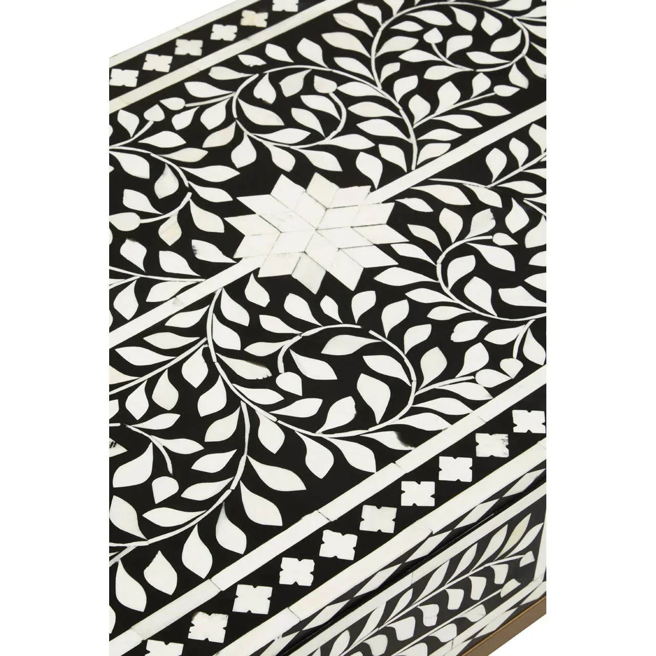 Black and white bone inlay table top with floral and geometric pattern detail