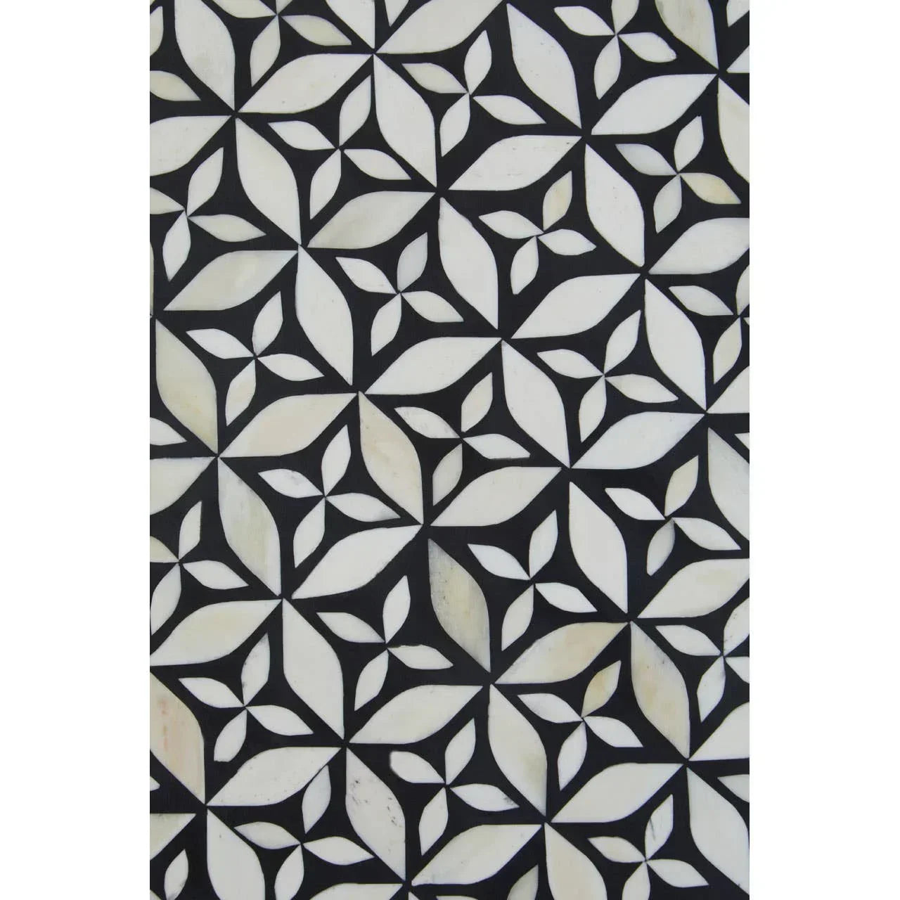 Geometric black and white bone inlay furniture panel with floral pattern detail