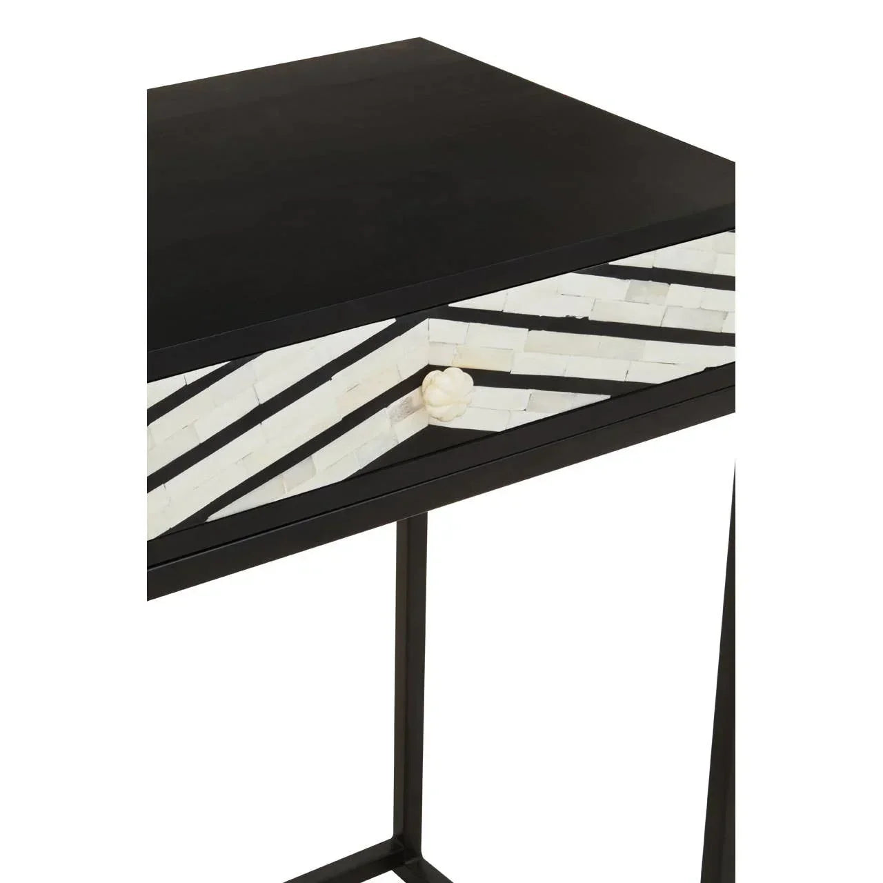 Black console table with white mosaic drawer and geometric pattern