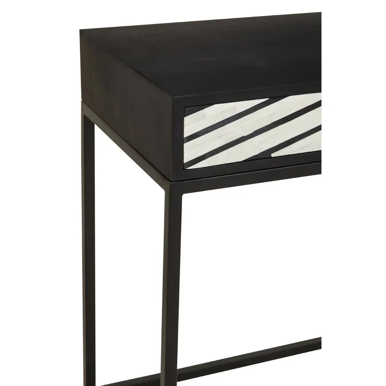 Black metal console table with white and black striped front drawer detail