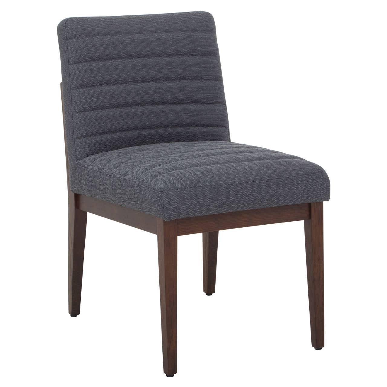 Grey fabric dining chair with horizontal stitching and dark wood legs, angled front view