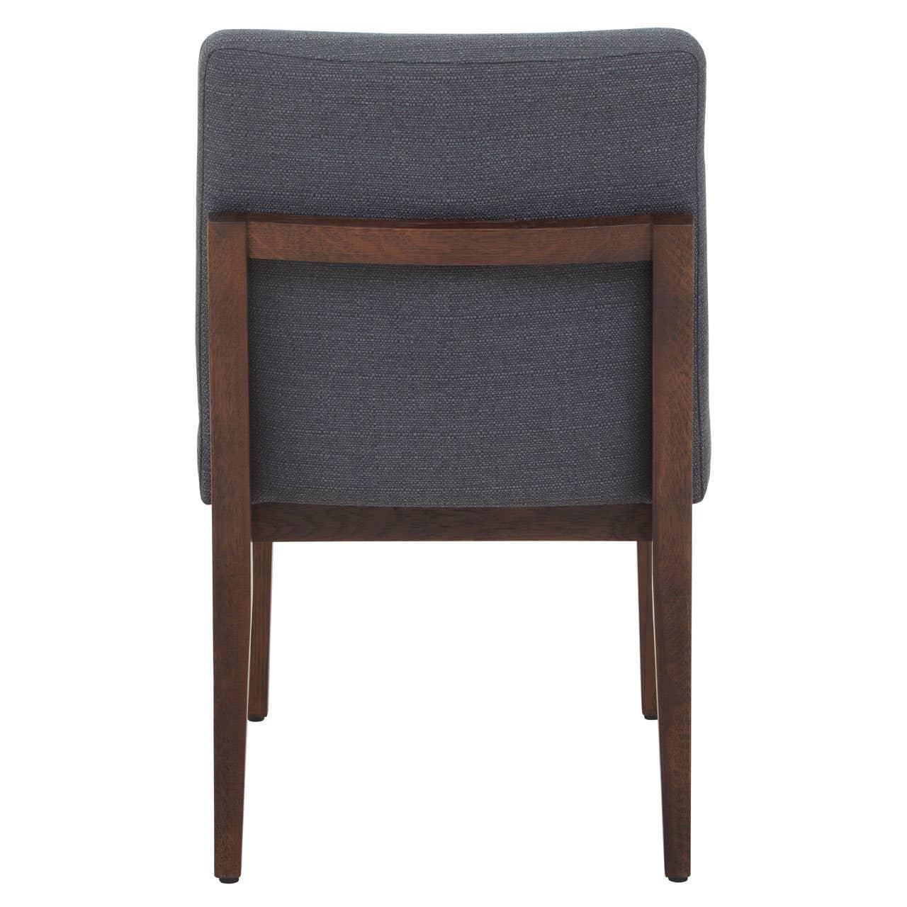 Rear view of grey upholstered armchair with wooden frame and legs
