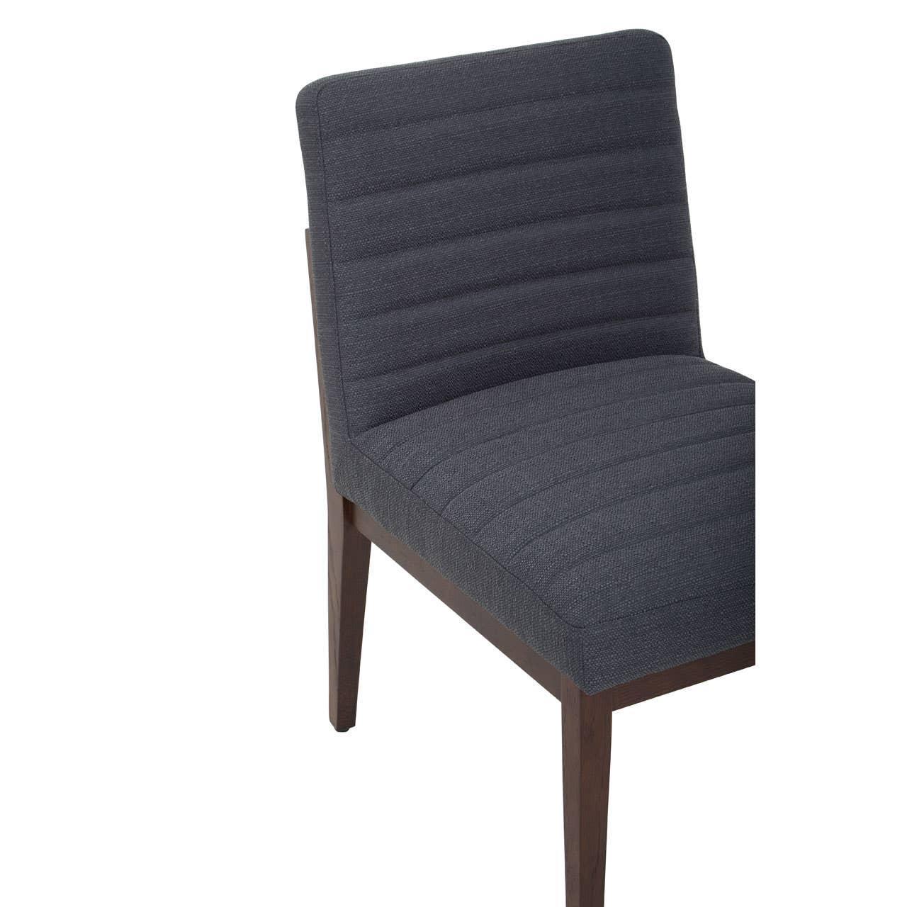 Dark grey upholstered dining chair with wooden legs, front angle view