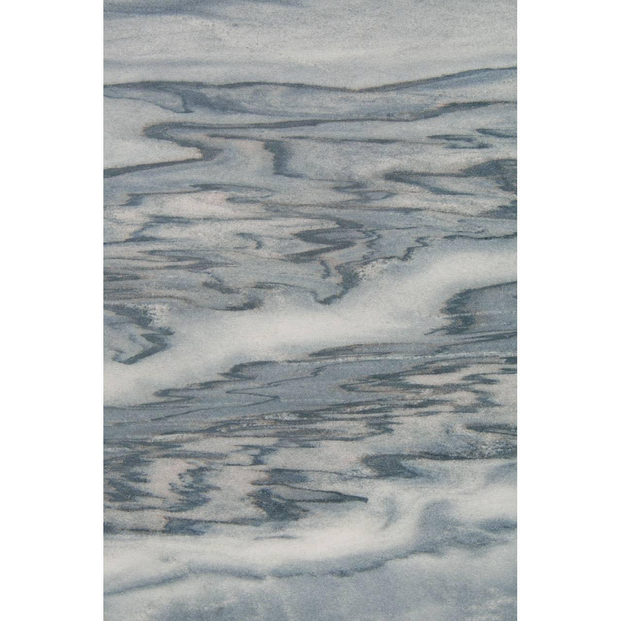 Blue and white marble effect tabletop surface with flowing grain pattern