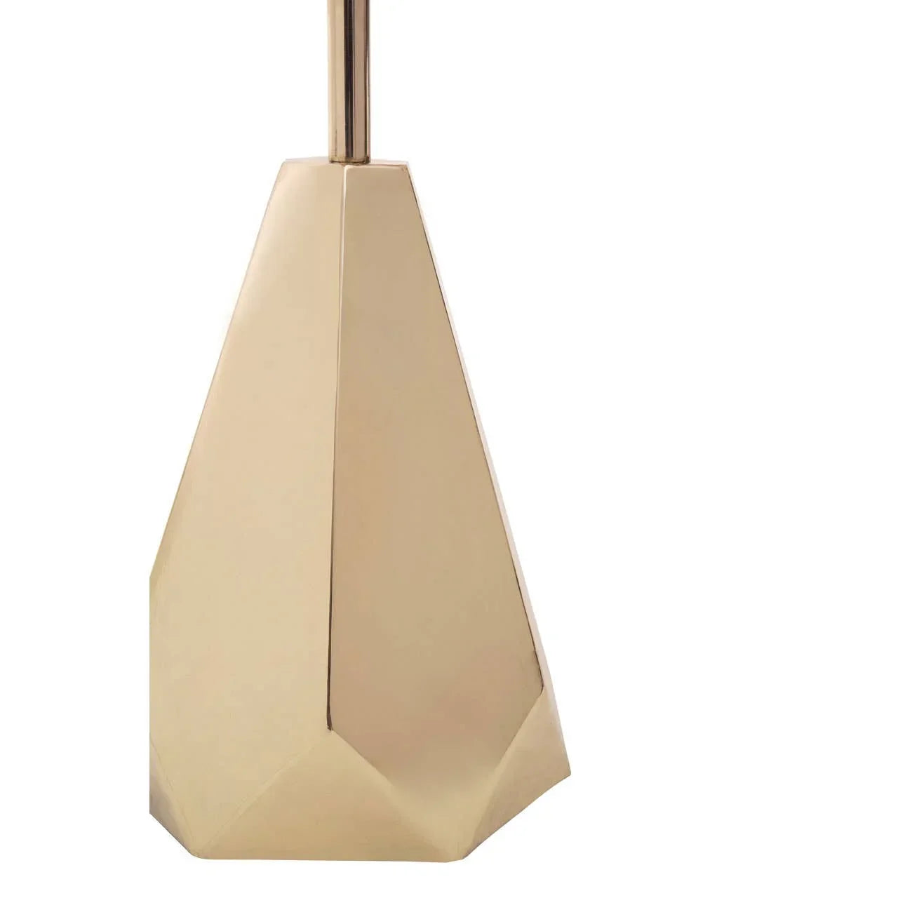 gold geometric metal lamp base with faceted design on white background