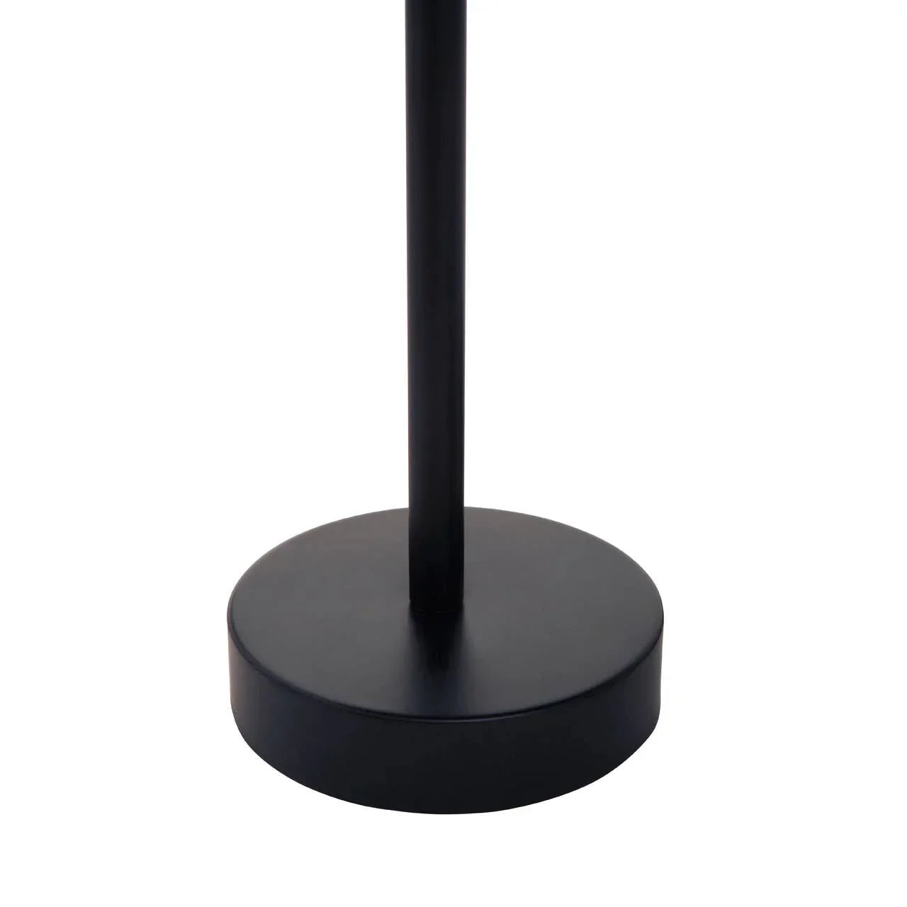 Black metal floor lamp round base close up