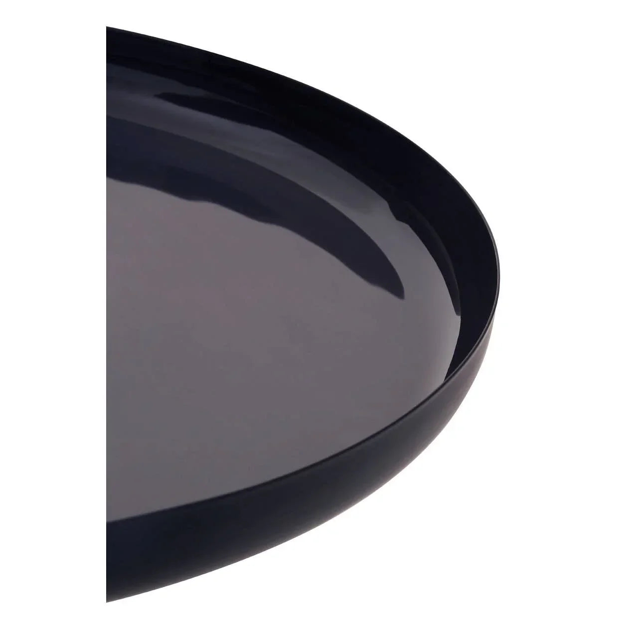 Glossy black metal tray closeup showing round shape and raised edge