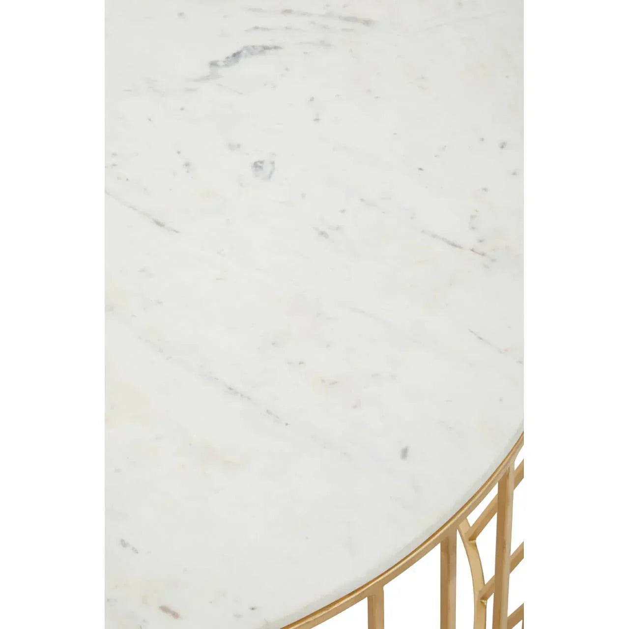 Round marble top table with gold metal base, close-up view