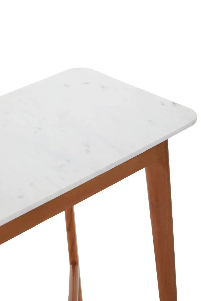 White marble top table with wooden legs, close-up showing corner and leg details