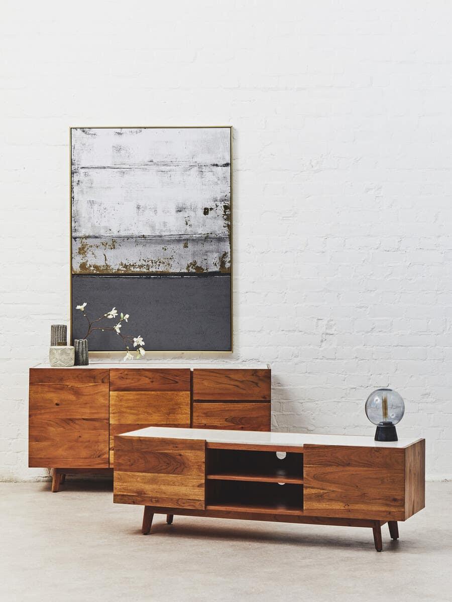 Solid wood sideboard and TV unit with minimalist decor against white brick wall