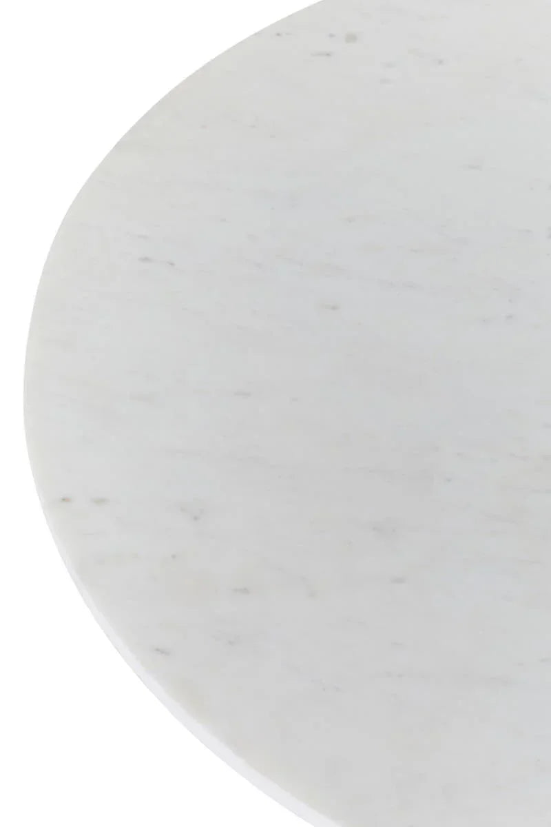 Round white marble tabletop close-up with subtle grey veining