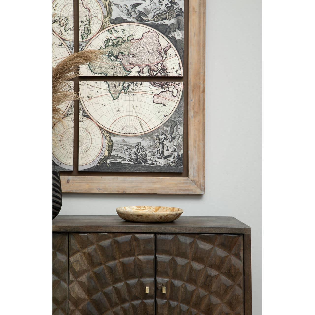 Geometric wood sideboard with textured doors, decorative bowl, and framed world map wall art