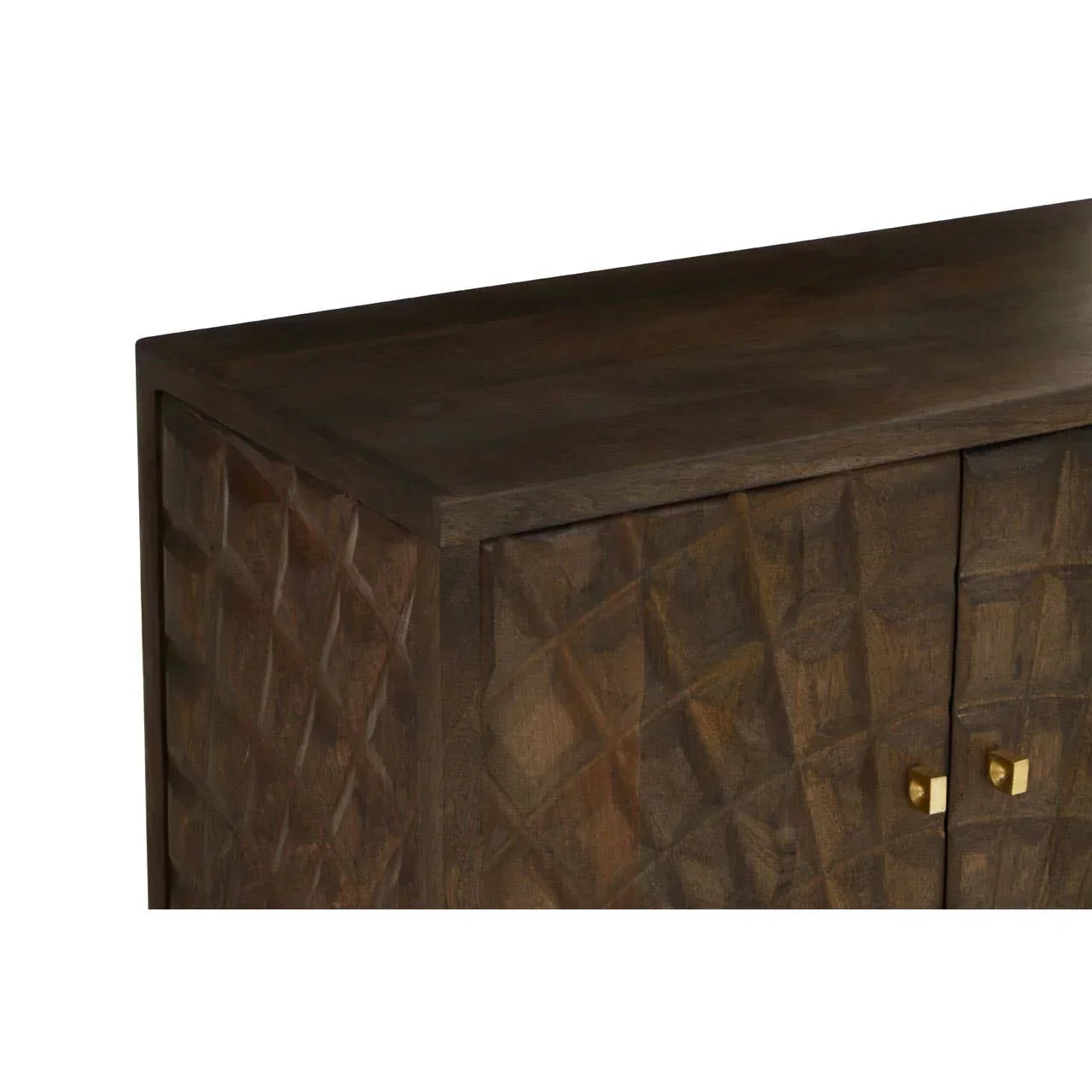 Close-up of carved wood sideboard with geometric pattern and gold handles