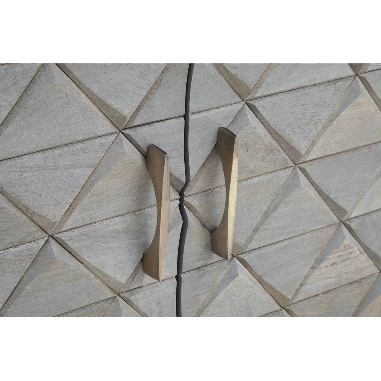 Geometric wood cabinet door with textured diamond panels and brass handles close-up