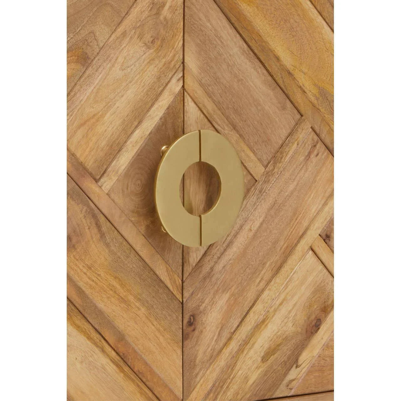 Chevron wood cabinet door with round gold handle close-up