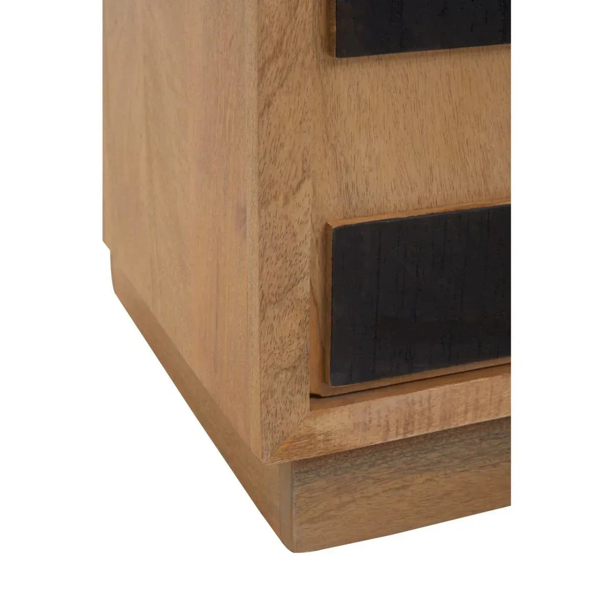 Closeup of wooden furniture corner with natural finish and dark drawer handles