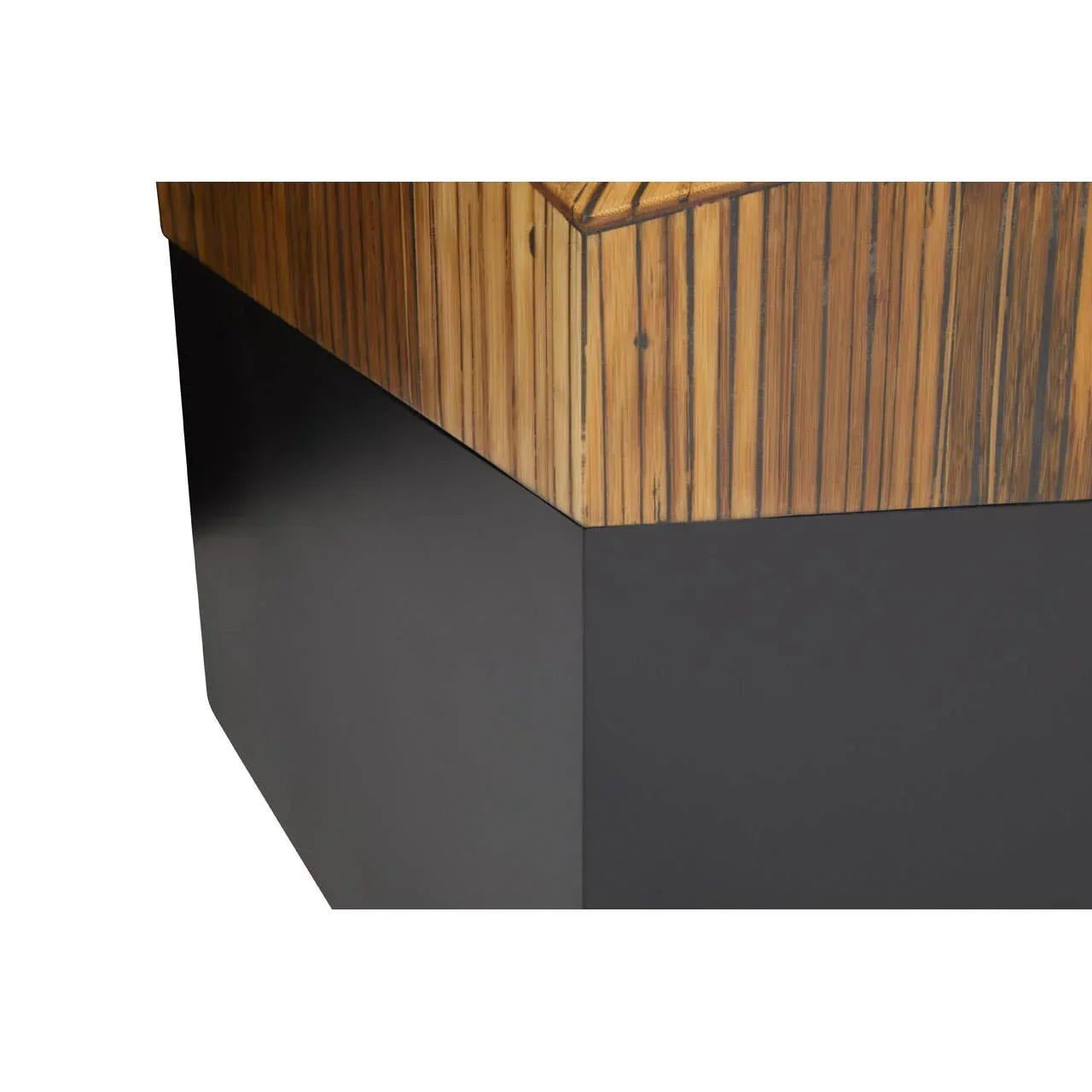 Closeup corner of wood and black metal furniture base showing modern design detail