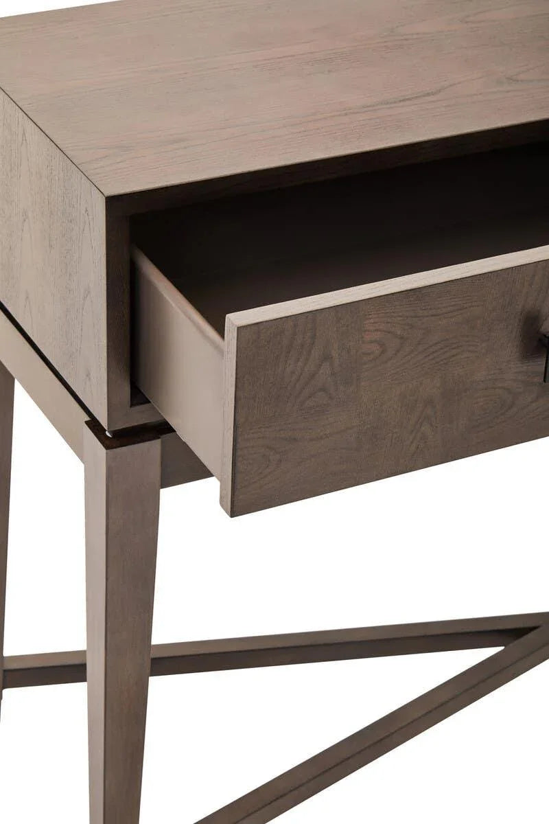 Wooden desk with open drawer and angled legs in a contemporary finish