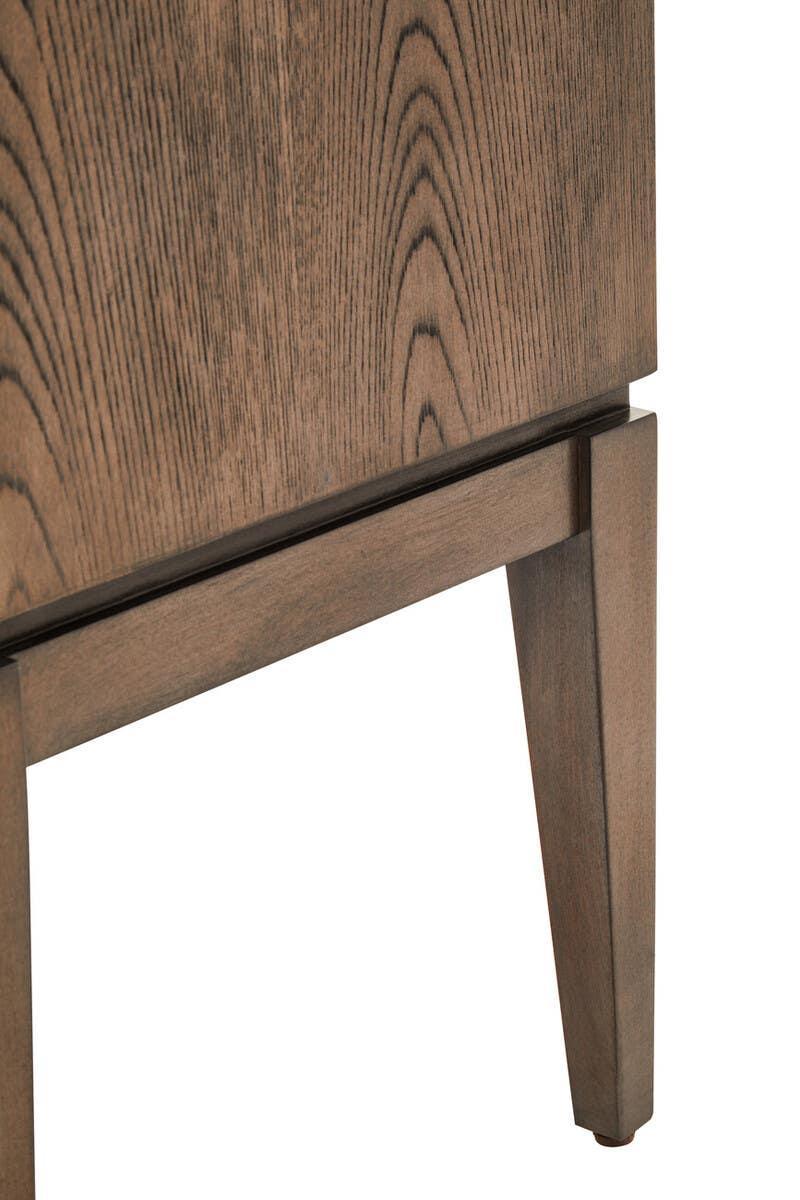 Close-up of wooden furniture leg with natural wood grain texture
