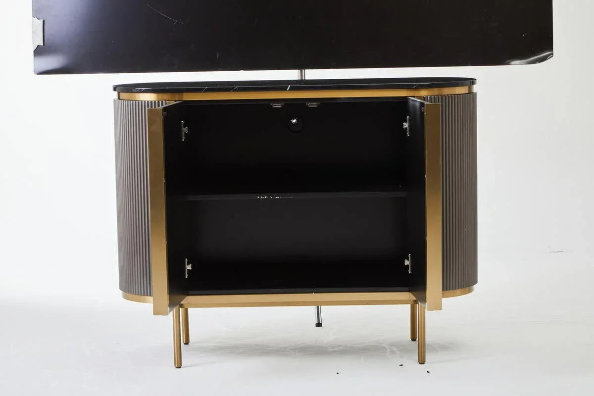 Modern sideboard cabinet with open doors, black interior, gold frame, and fluted sides