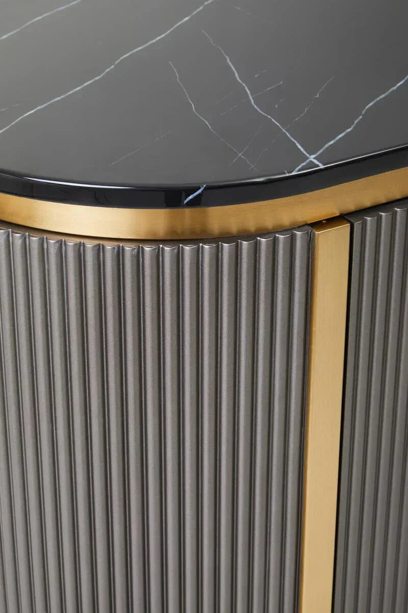 Black marble top sideboard with vertical ribbed panels and gold trim accent