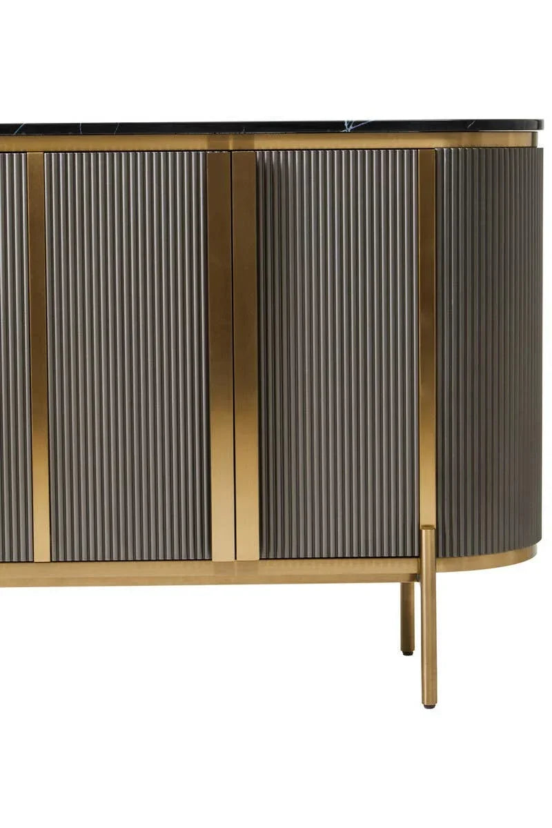 Modern sideboard with fluted grey panels, gold frame, and black marble top