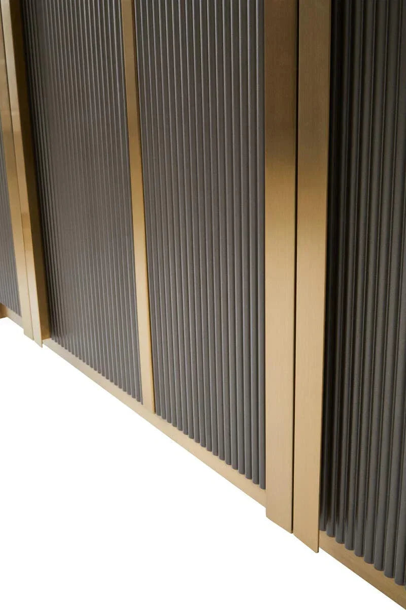 Gold and grey ribbed sideboard cabinet detail with vertical paneling