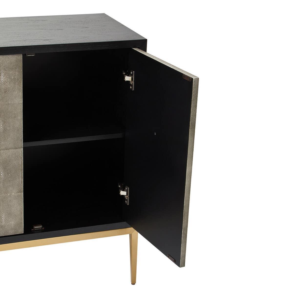 Modern black storage cabinet with open door, gold legs, interior shelf visible