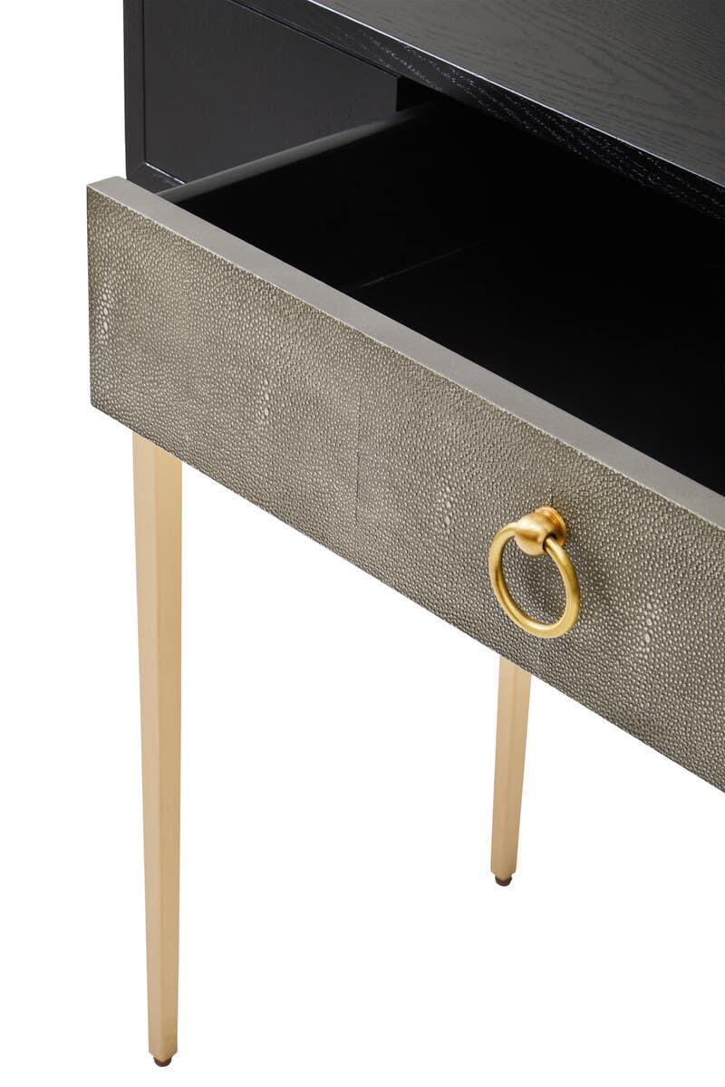 Textured bedside table with gold legs and drawer handle, open drawer visible
