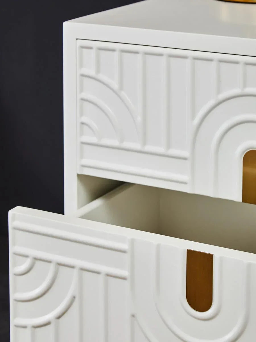 White bedside cabinet with geometric drawer front and one open drawer