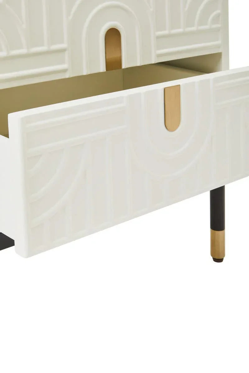 White drawer with embossed geometric design and gold handle, open on modern metal legs