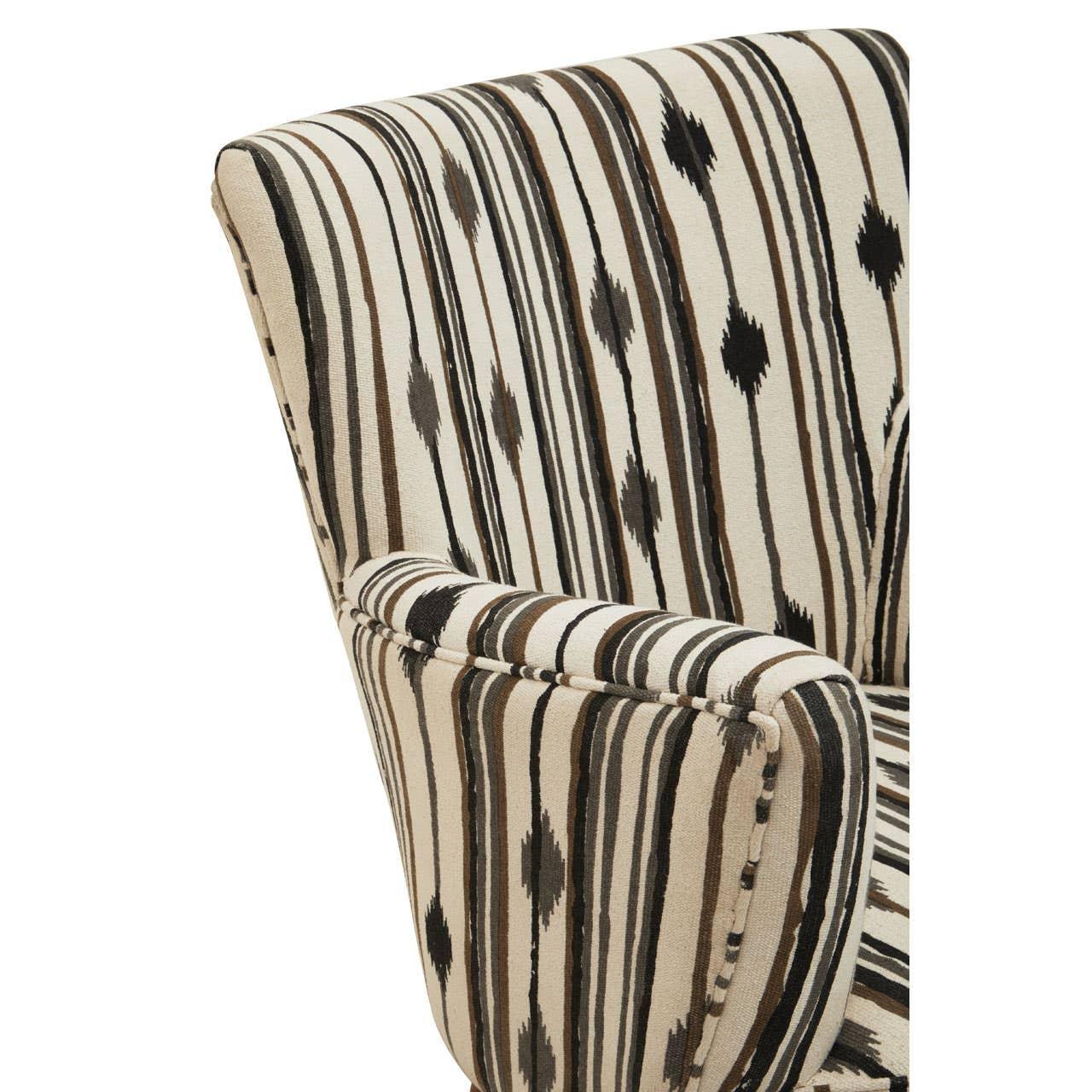 Striped accent chair with beige, brown and black upholstery, close-up of armrest and back
