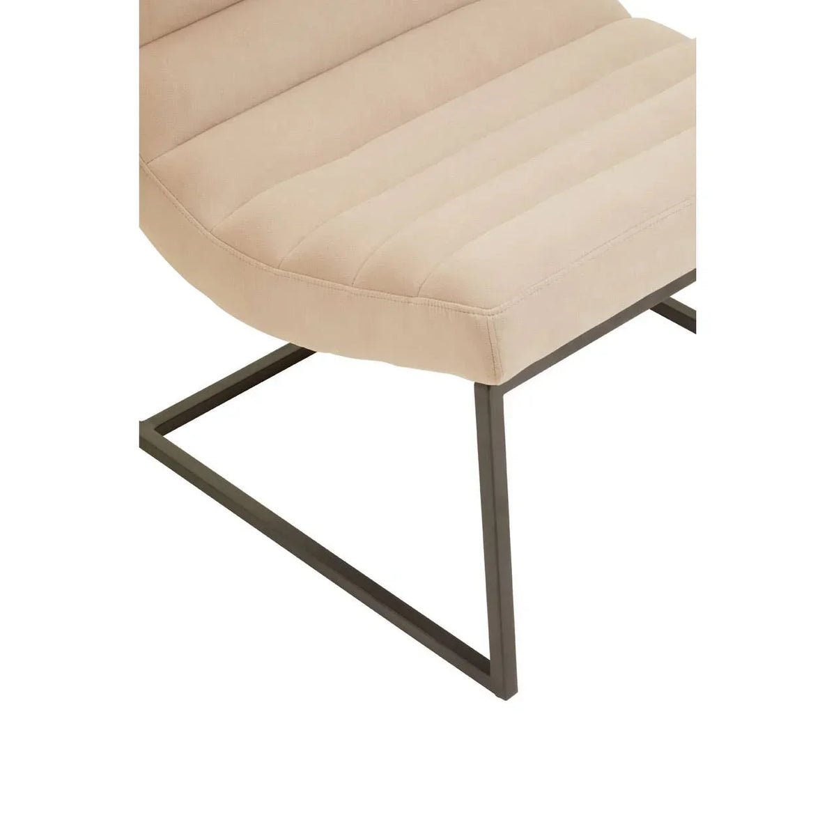 Beige fabric dining chair with black metal legs and ribbed seat detail, side angle view