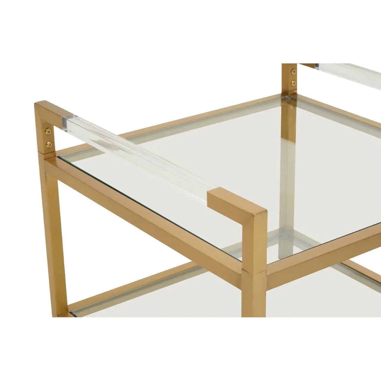 Gold frame glass coffee table with clear acrylic side handles, corner detail view