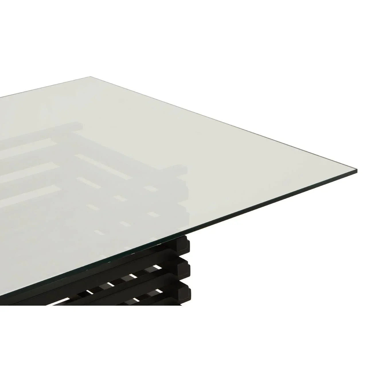 Glass dining table with black wooden slatted base, close-up of corner and top surface