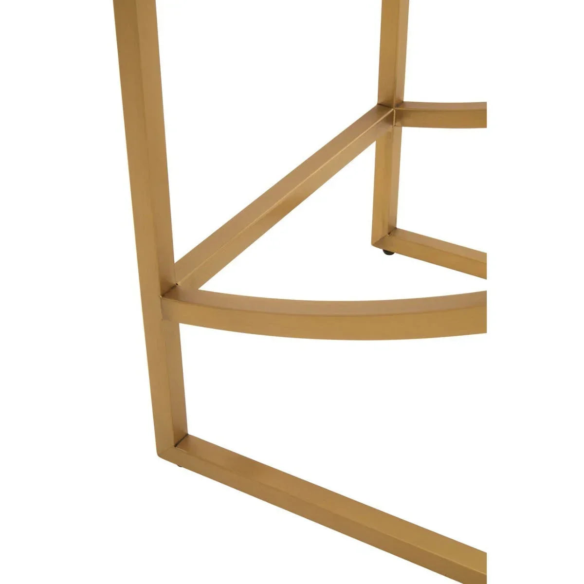 Gold metal table leg frame with geometric design, close-up view