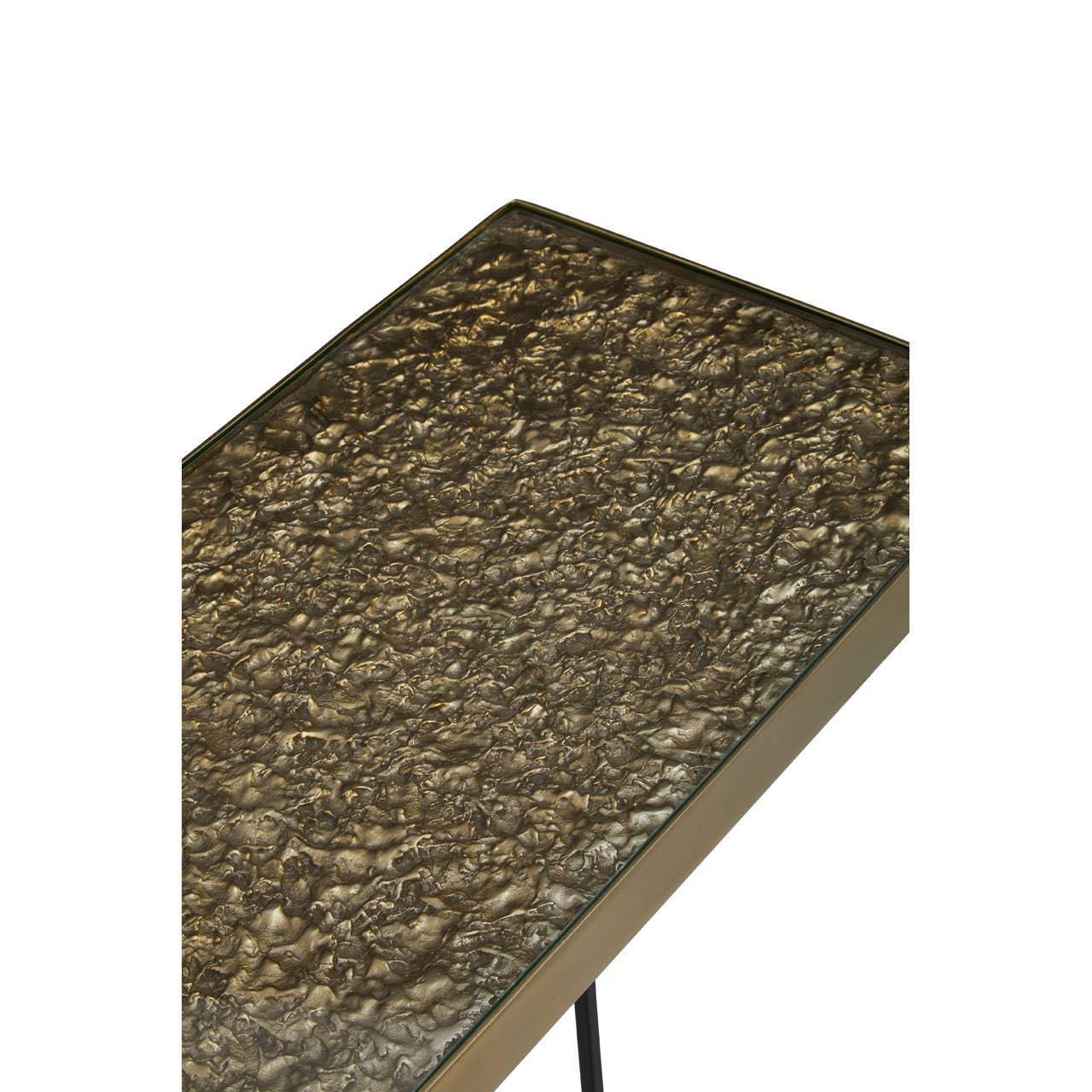 Rectangular bronze textured metal side table with black metal legs, close-up of tabletop