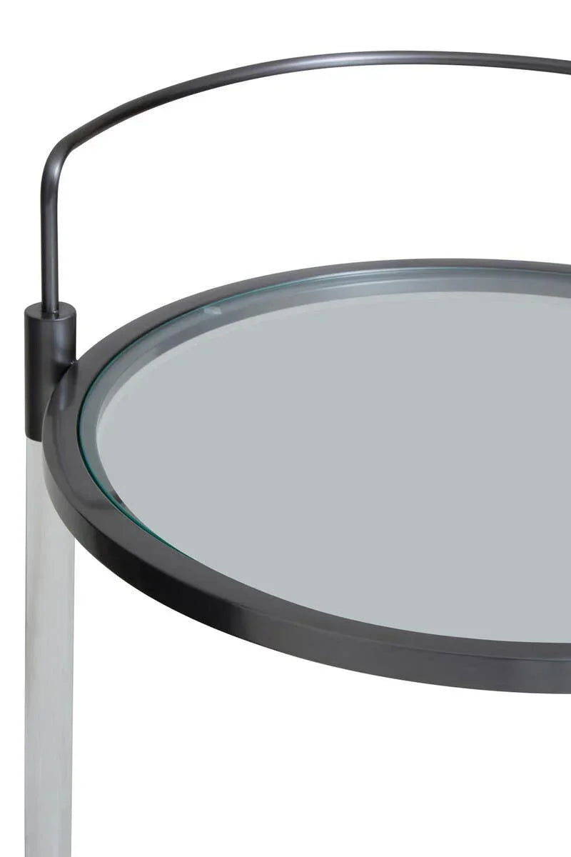Round glass side table with black metal frame and handle, close-up top angle