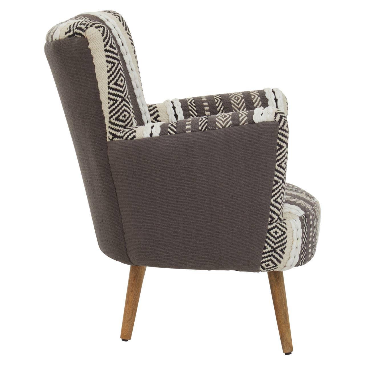 grey accent chair with patterned upholstery and wooden legs side angle view